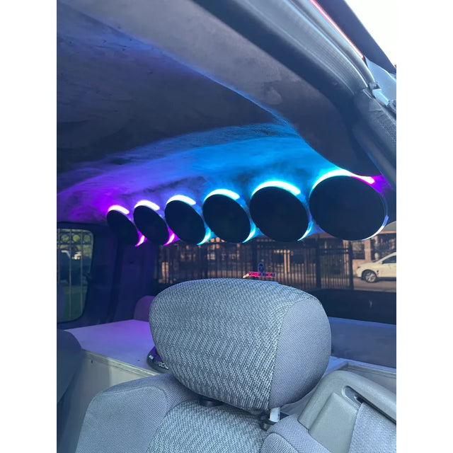 Car roof speaker pod with six round speakers glowing blue/purple