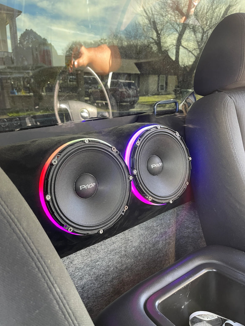 Car audio speaker ring set with two illuminated RGB woofer rings, car interior view