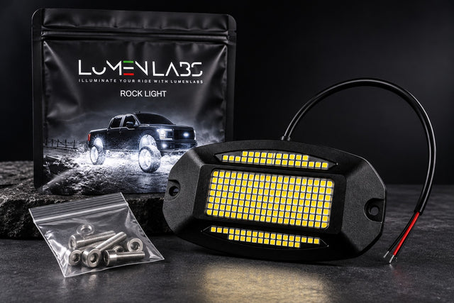 Black LED rock light with Pure White LED panel, power wire, and metal mounting hardware