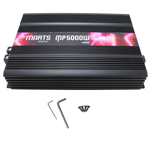 Black class D monoblock amplifier with cooling fins, plus hex keys and wrench