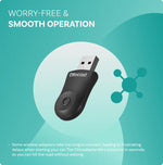 Otto Cast mini wireless adapter, black USB dongle with LED button in hand