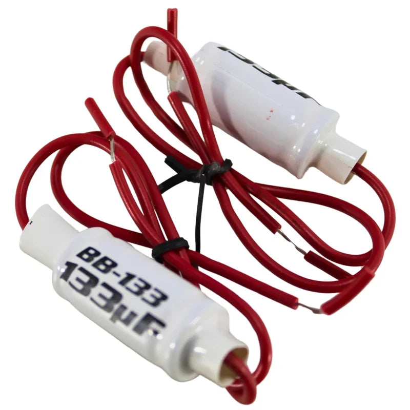 Audiopipe in-line noise filter pair with red leads and white cylindrical housings