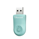 Otto Cast mini wireless CarPlay/Android Auto adapter, teal USB plug with LED button
