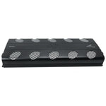 Black car amplifier top panel with dotted vent grille and front label markings