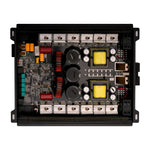 Open class D amplifier chassis showing circuit boards, capacitors, and wiring