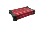 Car audio power amplifier with red and black heatsink, angled view