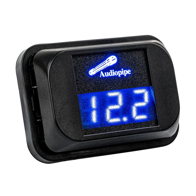 Audiopipe digital voltage meter with blue LCD display reading 12.xV, black housing
