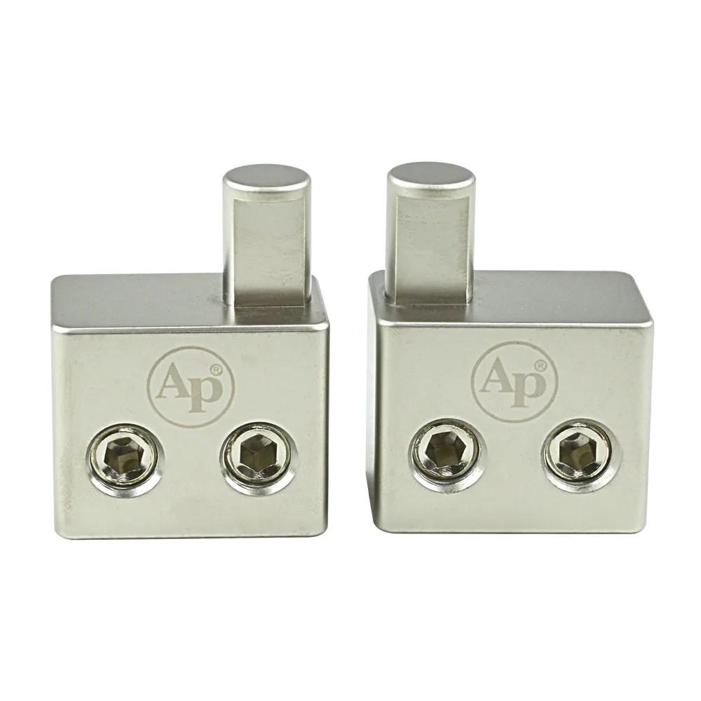 Audiopipe amp input reducer pair, front view of silver blocks with two threaded ports
