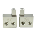 Audiopipe amp input reducer pair, front view of silver blocks with two threaded ports