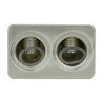 Audiopipe amp input reducer close-up of two threaded ports on silver plate