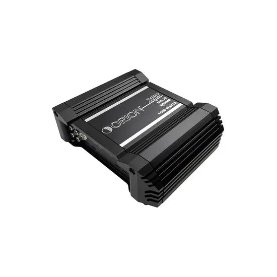Black monoblock car amplifier angled view with heatsink fins and front label