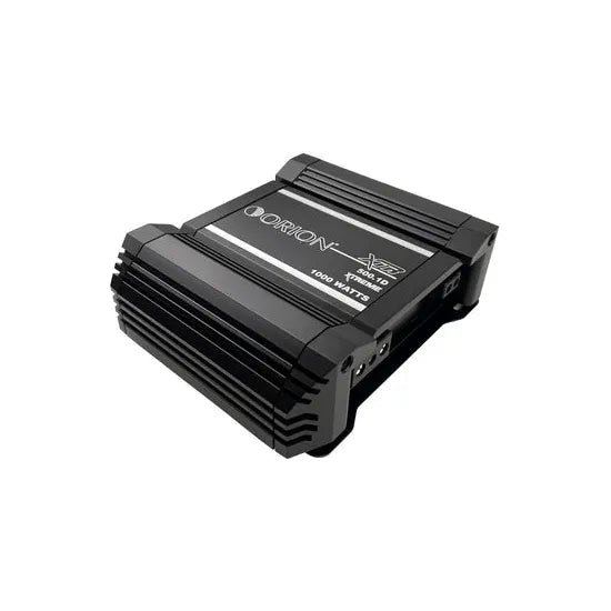 Black monoblock car amplifier top view with central label and cooling fins