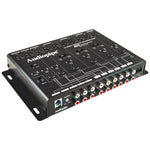 Black active crossover unit angled view with rotary controls and signal routing labels