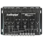 Black 6-way active crossover with multiple rotary knobs and labeled frequency controls