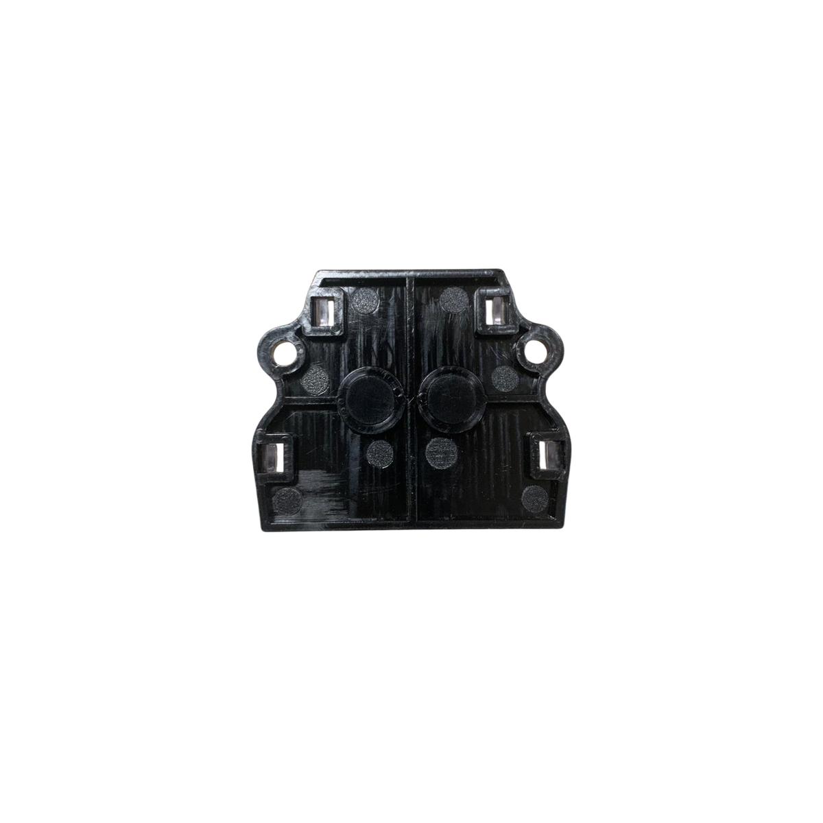 Black plastic distribution block base with mounting posts, underside view.