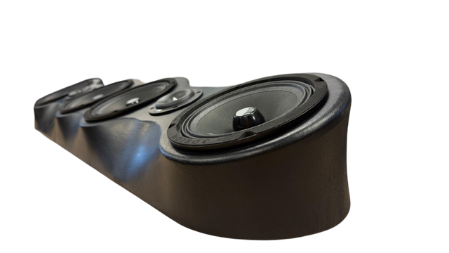 Black speaker bar side view with large center driver and smaller tweeter openings