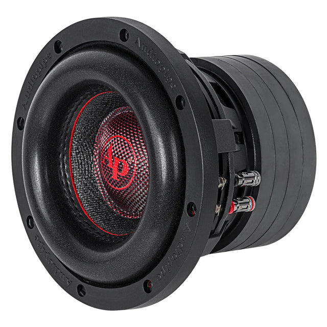Black 6-inch quad stack subwoofer showing speaker terminals and red accent ring