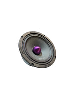 Car speaker woofer close-up with purple cone driver and metal frame